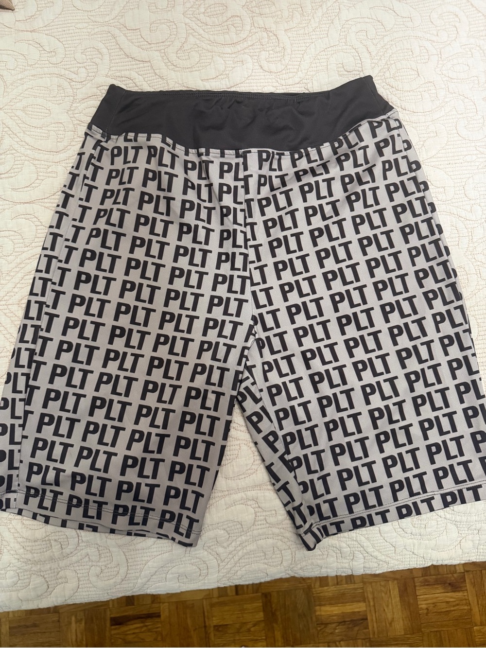 PrettyLittleThing Tan & Brown All-Over PLT Logo Athletic Shorts